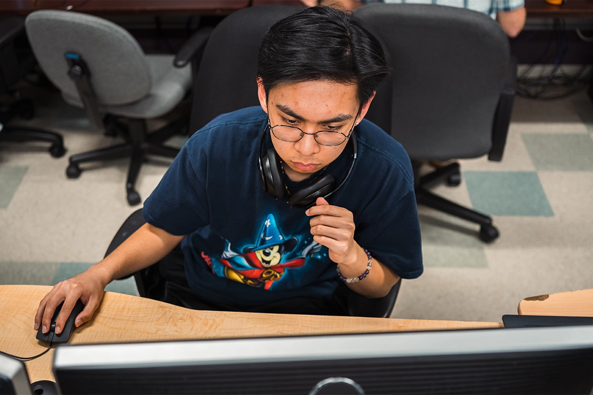 student working at the computer