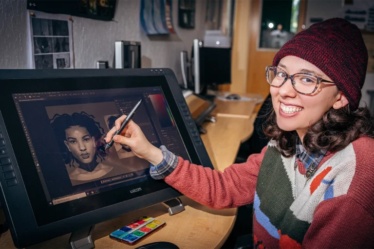 student working with a wacom tablet