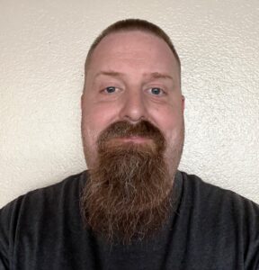 Headshot of USV Faculty Member, Charles Kinter